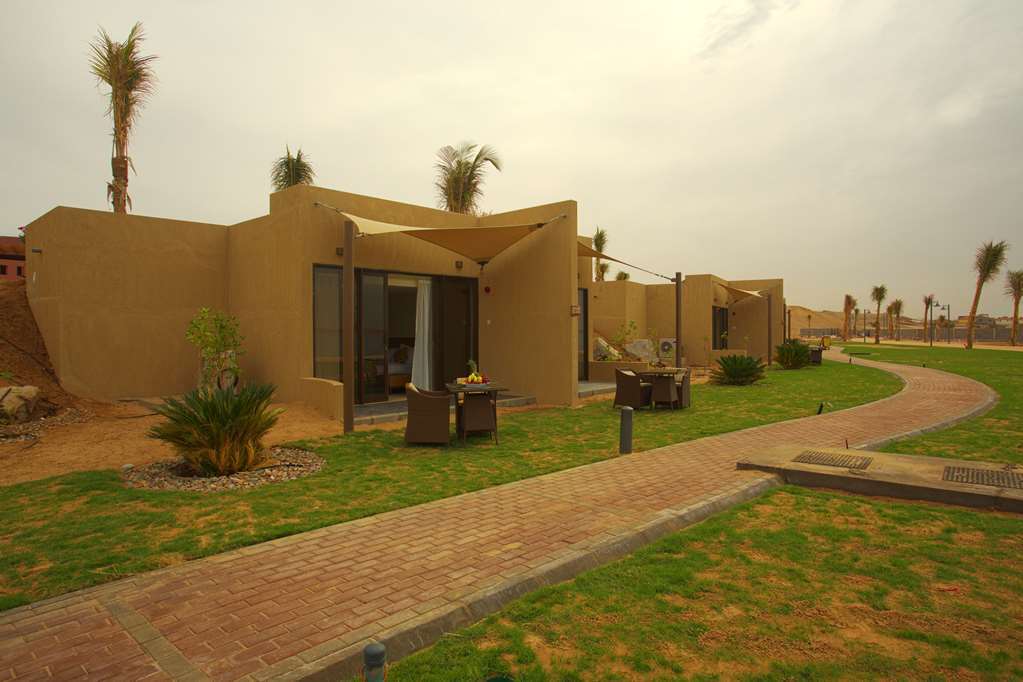 Golden Tulip Sharma Resort Room photo